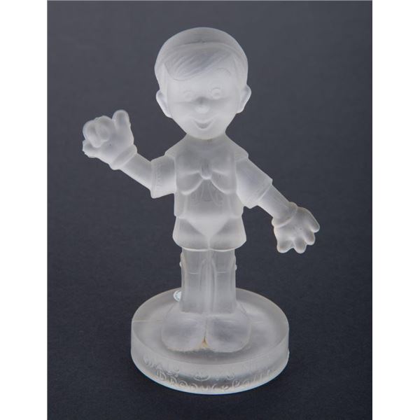 A 1970s Frosted Crystal Pinocchio Figurine.
