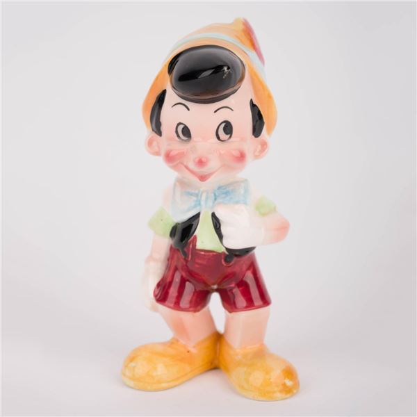 A Pinocchio Ceramic Figurine.