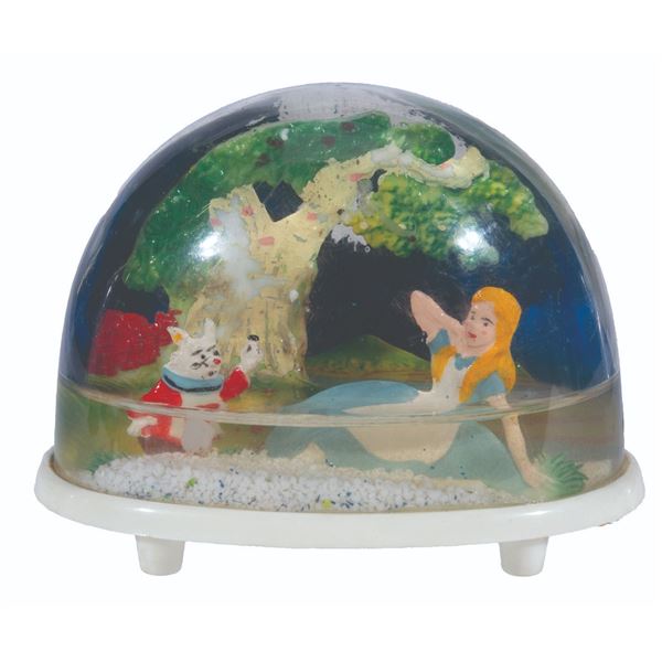 An "Alice in Wonderland" Snow Globe by Marx.