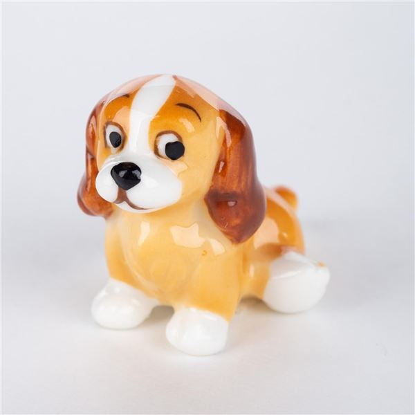 A "Lady and the Tramp" Puppy Miniature Figurine.
