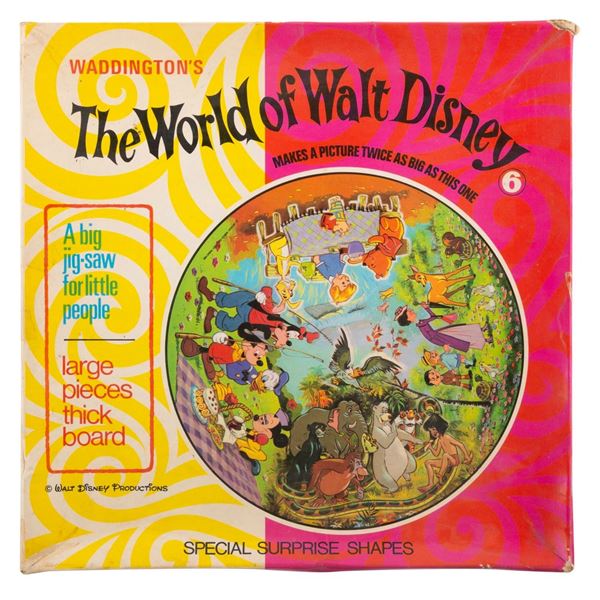 A "The World of Walt Disney" Circular Jigsaw Puzzle.