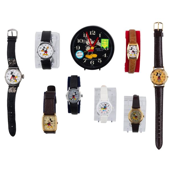 A Collection of Mickey Mouse Watches and Clock.