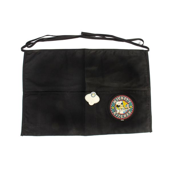 A Mickey's Kitchen Cast Member Apron and Name Badge.