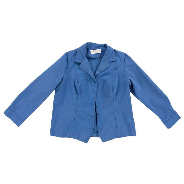 A Disney Parks Female Cast Member Shirt.