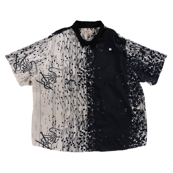 A Walt Disney World Cast Member Music Note Shirt.