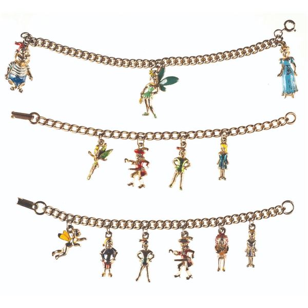 Three Early "Peter Pan" Charm Bracelets.