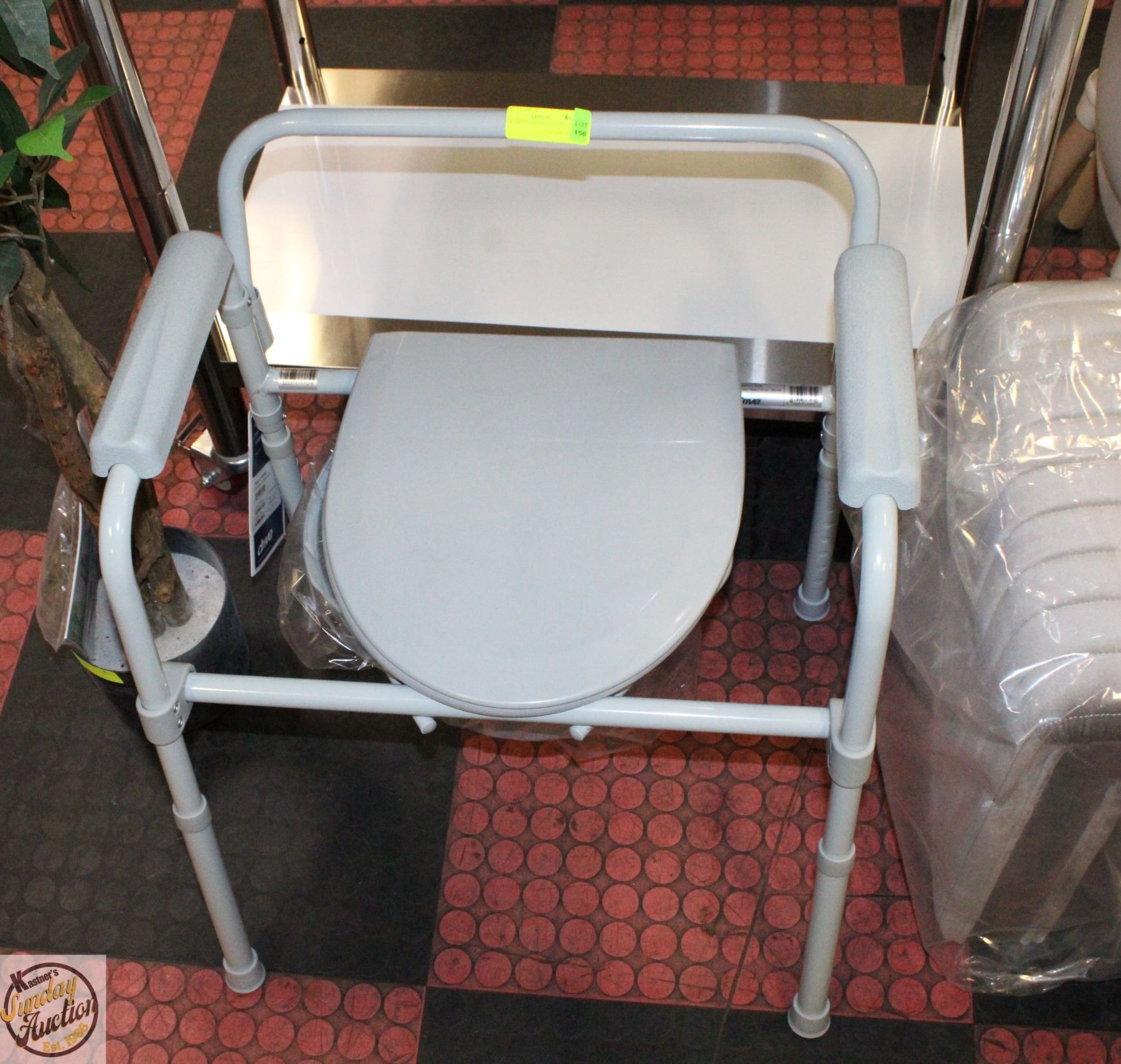 NEW GREY FOLDING COMMODE