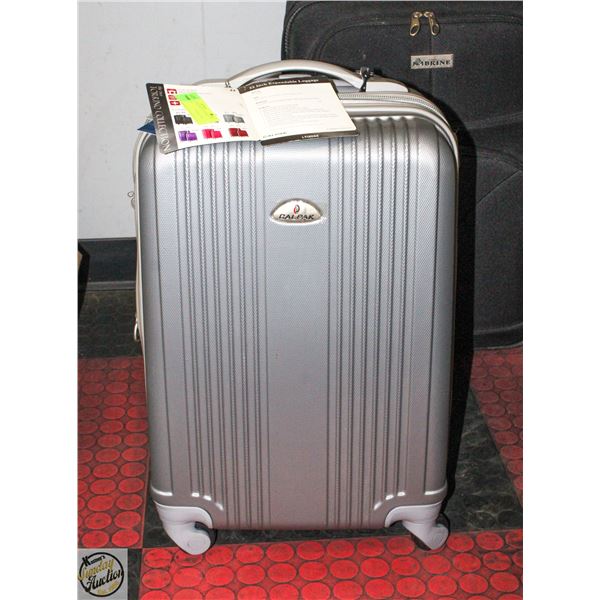 CAL PACK HARDHELL SUITCASE WITH TAGS