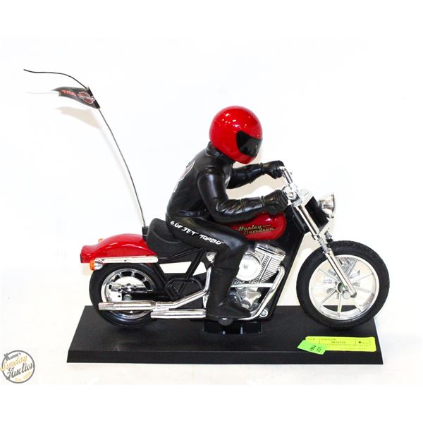 HARLEY DAVIDSON MOTOR CYCLE ON A STAND