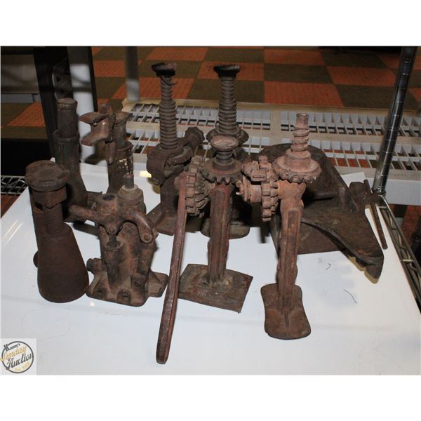 ANTIQUE CAST IRON TOOLS AND JACKS