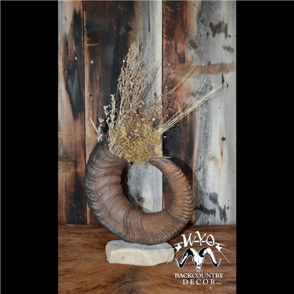 DALL SHEEP HORN VASE ON A ROCK BASE