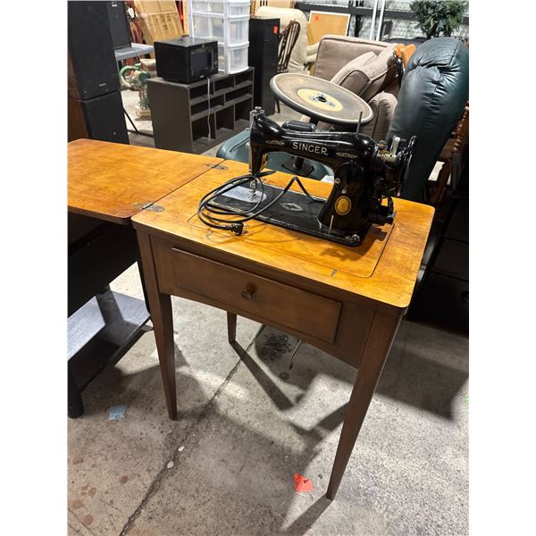 Antique singer, sewing machine and cabinet