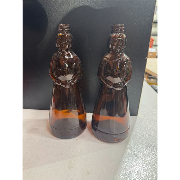 Mrs. Butterworth's syrup bottles