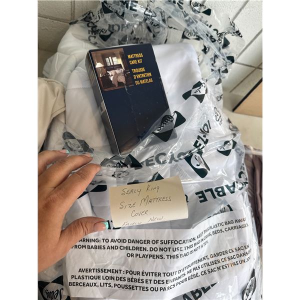 Silly king size mattress, cover, and mattress care kit, never used