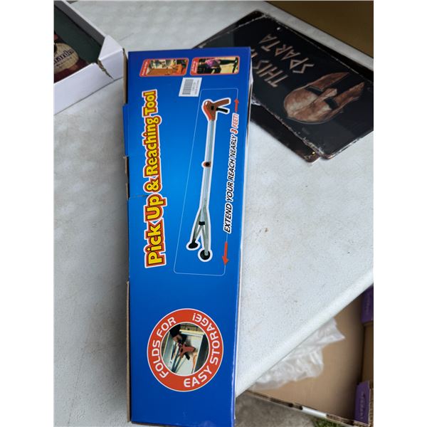 Pick up and reaching tool