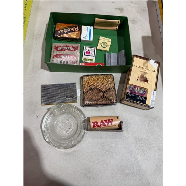 Smoking related items, little cigars, tin, etc.
