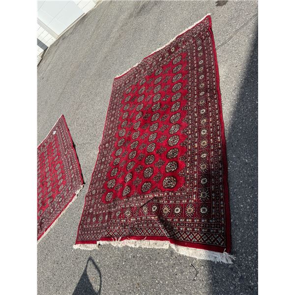 Area carpet measures 105" x 71" approximately