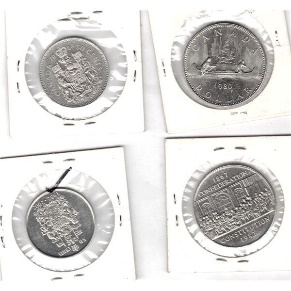 Three Canadian Dollar Coins and 50 cent coin