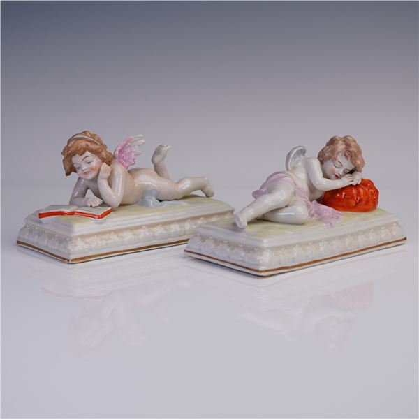 Pair of German Porcelain Putti Figurines