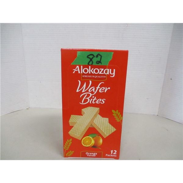 FREIGHT DAMAGE (AS IS):  APPROX. 12 PACKS ORANGE FLAVOR WAFER BITES - BOX