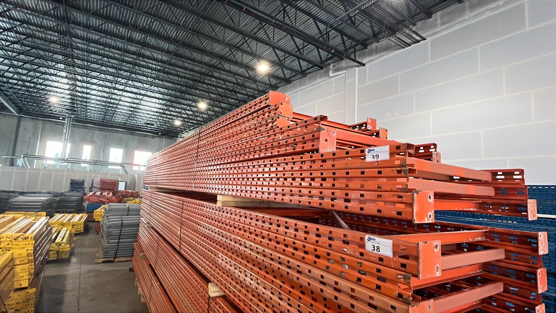 ORANGE PALLET RACKING UPRIGHTS (8 PCS.) - APPROX. 18,20 & 22FT WITH ...