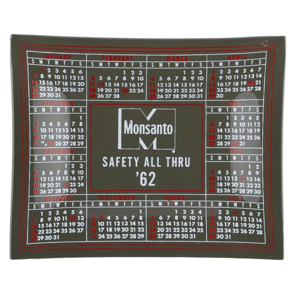 A Monsanto Smoked Glass Calendar Tray.