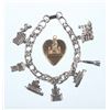 Image 1 : A Disneyland Magic Charm Bracelet and Locket.