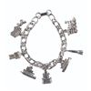 Image 3 : A Disneyland Magic Charm Bracelet and Locket.