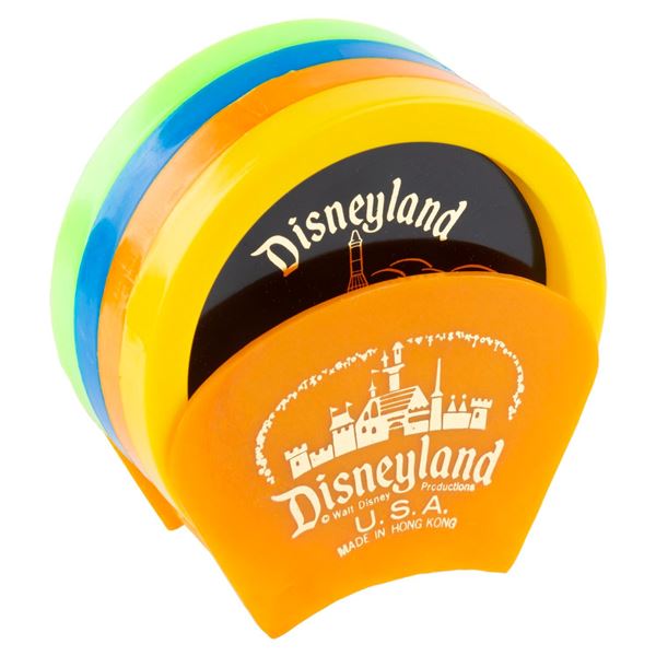 A Disneyland Coasters and Holder Set.