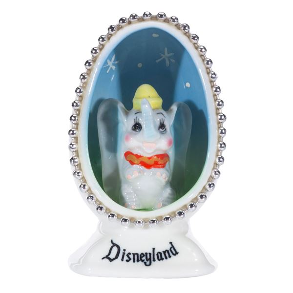 A Disneyland Dumbo China Egg Figurine.