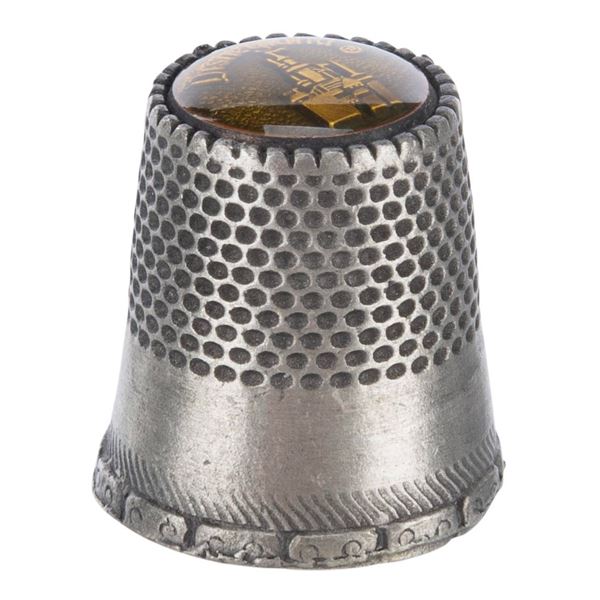 A Disneyland Sleeping Beauty Castle Thimble.