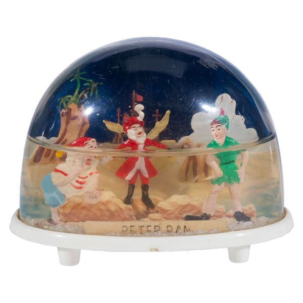 A 1960s"Peter Pan” Snow Globe by Marx.