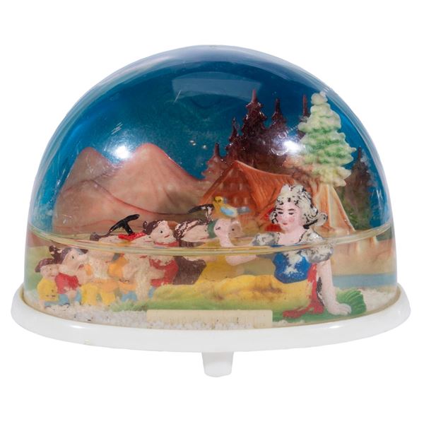A Snow White and the Seven Dwarfs” Snow Globe.