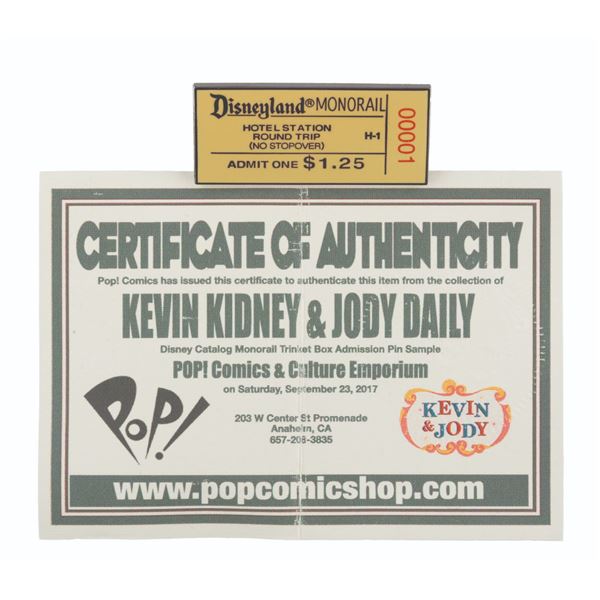 A Prototype Sample Monorail Ticket Pin.