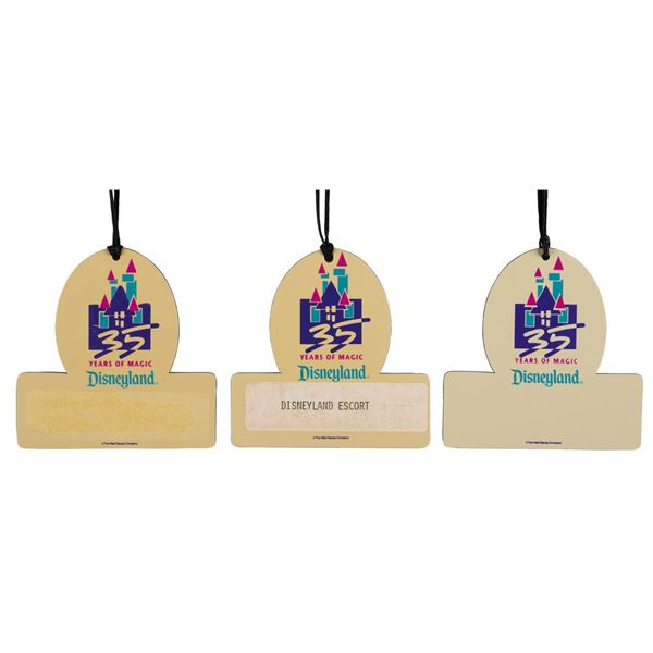 Three Disneyland 35th Anniversary Escort Badges.