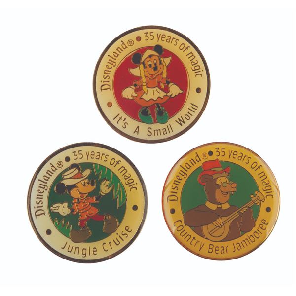 Three Disneyland 35 Years of Magic Attraction Pins.