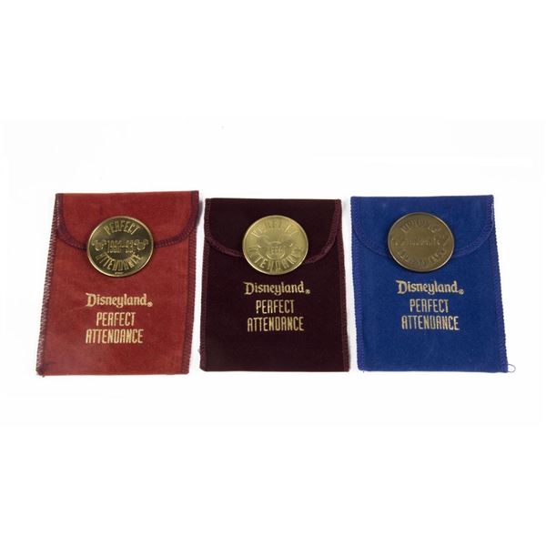Three Disneyland Cast Member Perfect Attendance Coins.