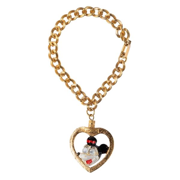 A Bracelet with Mickey and Minnie Reversible Charm.
