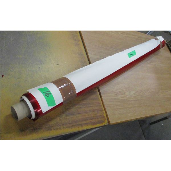 PARTIAL ROLL OF RED VINYL FILM PAPER
