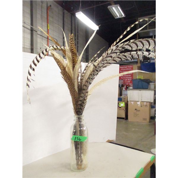 ESTATE:  BOTTLE C/W DECORATIVE FEATHERS