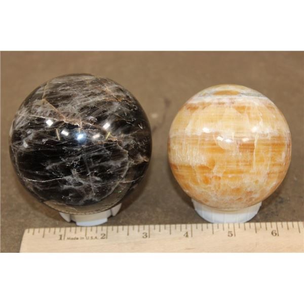 (1) BLACK MOONSTONE Mineral Sphere and (1) Banded ORANGE CALCITE Mineral Sphere (ONE$)