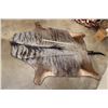 Image 2 : BLUE WILDEBEEST Hide Rug with Leather Piping, a Canvas Backing, and Hanging Loops
