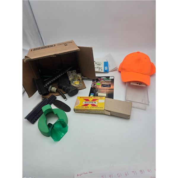 large assortment of gun parts, pieces and misc