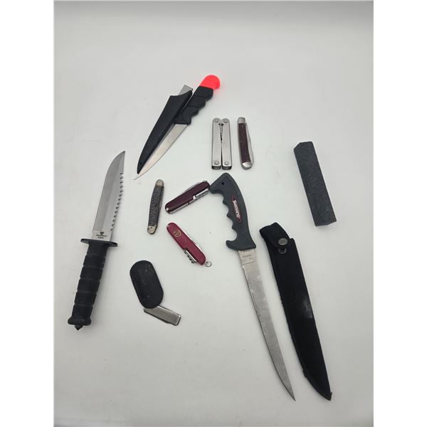 Assortment of knives and sharpening stones