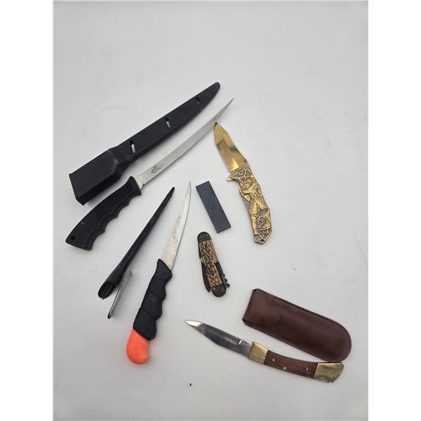 Assortment of knives and sharpening stones