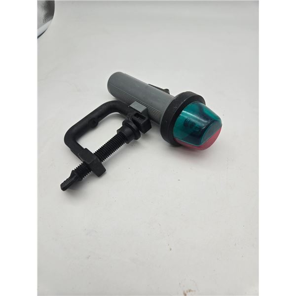 Battery powered bow light for canoe or other small craft.