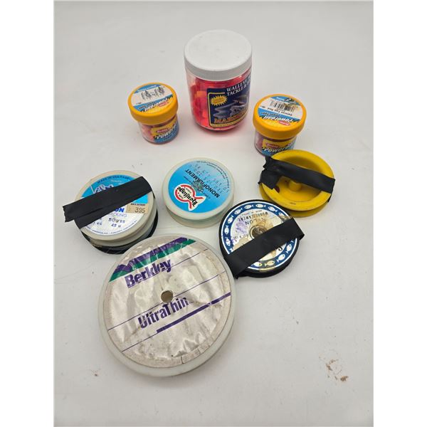 Spools of Fishing line and jars of bait.