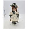 Image 1 : porcelain headed doll