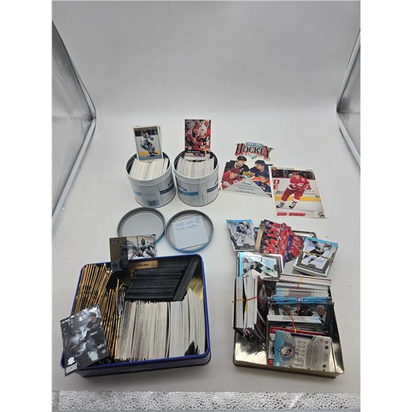 4 tins of hockey cards