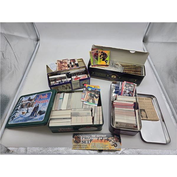 4 tins of hockey cards